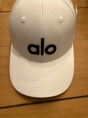 ALO Yoga White Cap with Black Logo
